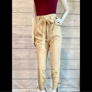Women’s tan high waisted paper bag pants (med).